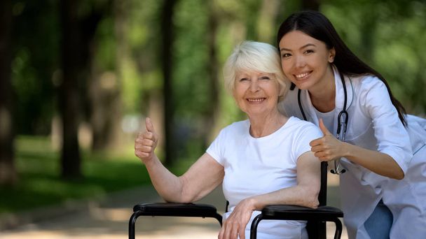 Nurse and elderly woman